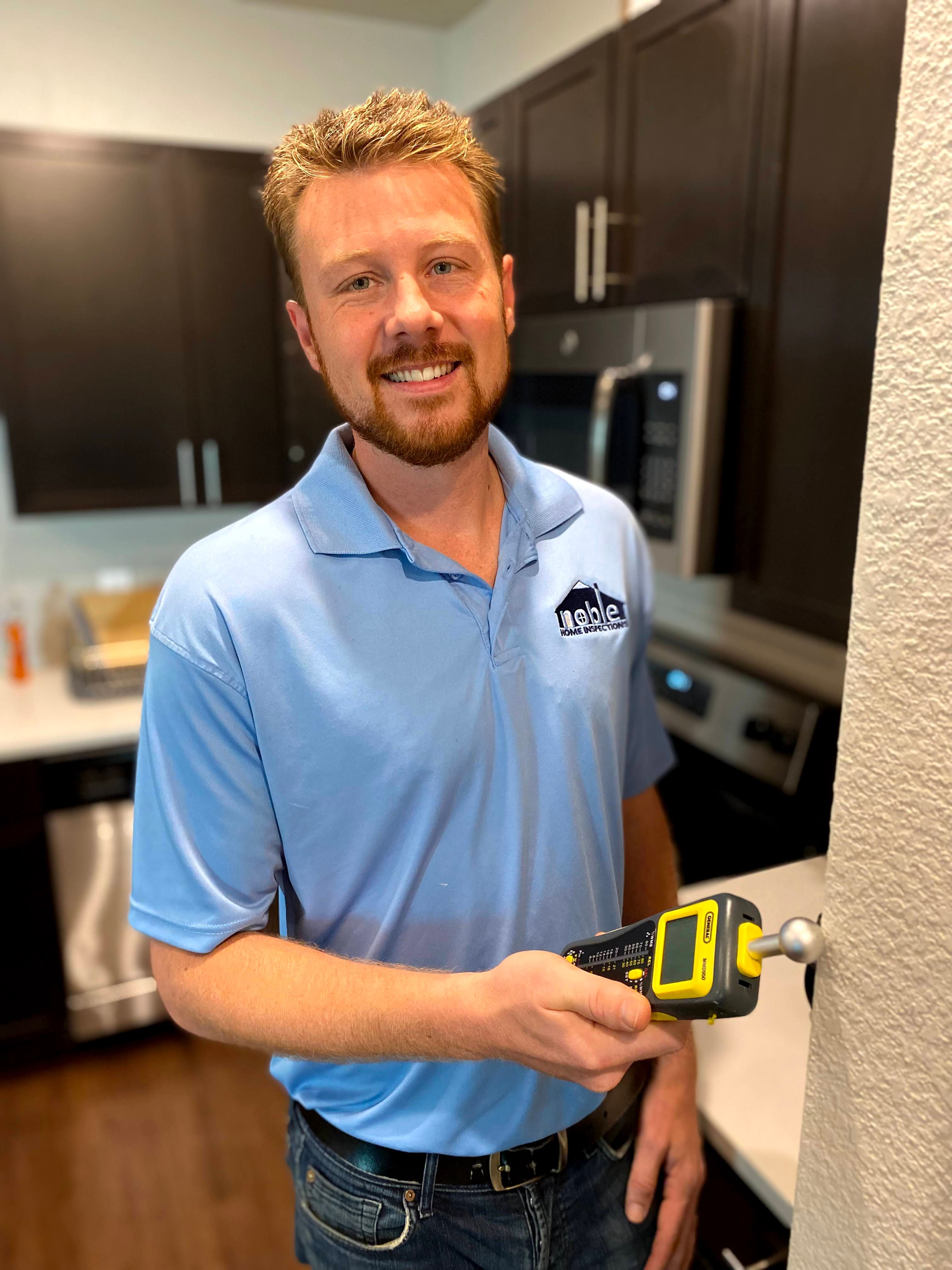 Inspector reviewing framing and systems before drywall installation
