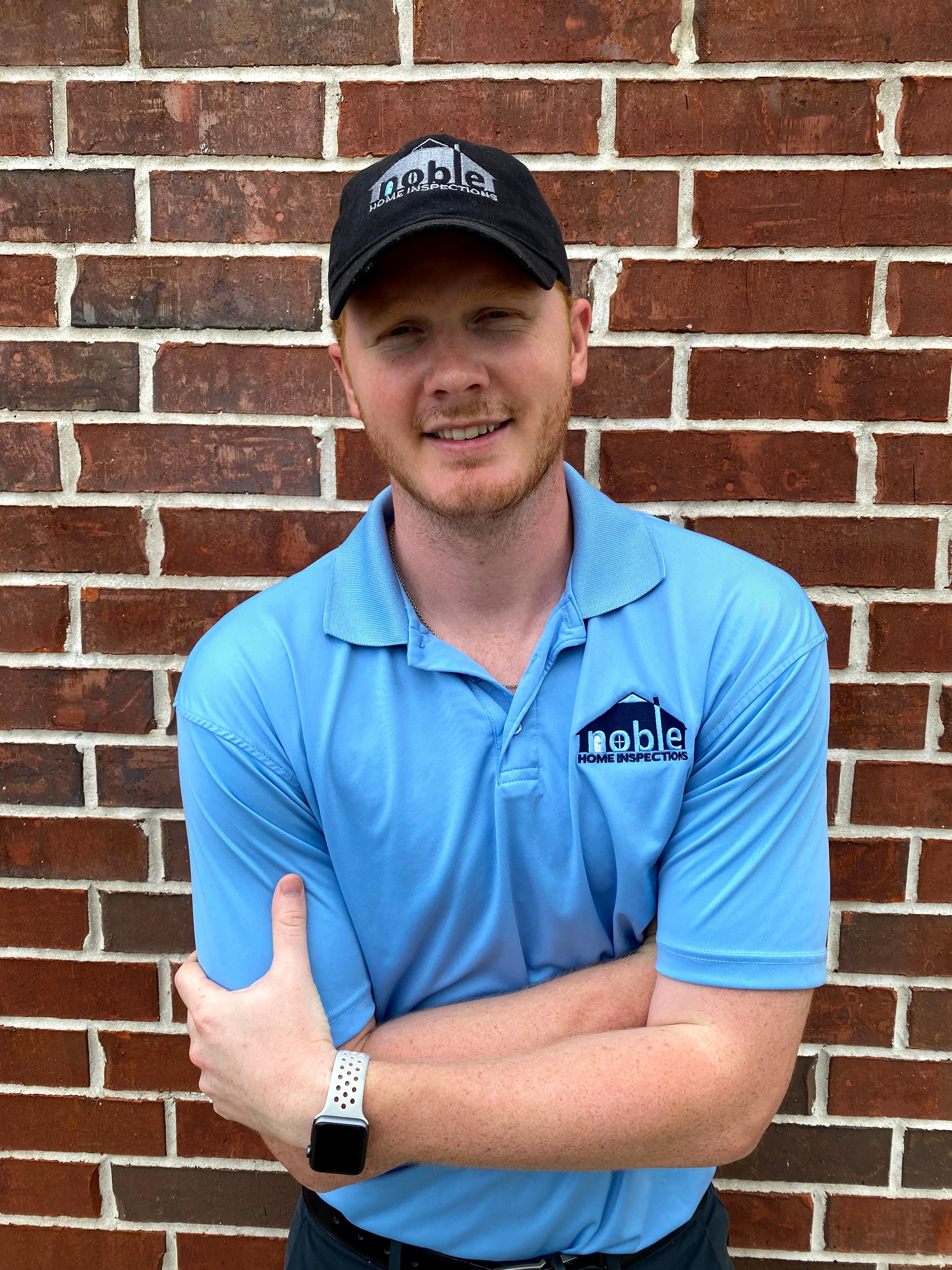 Home inspector reviewing property systems during an inspection