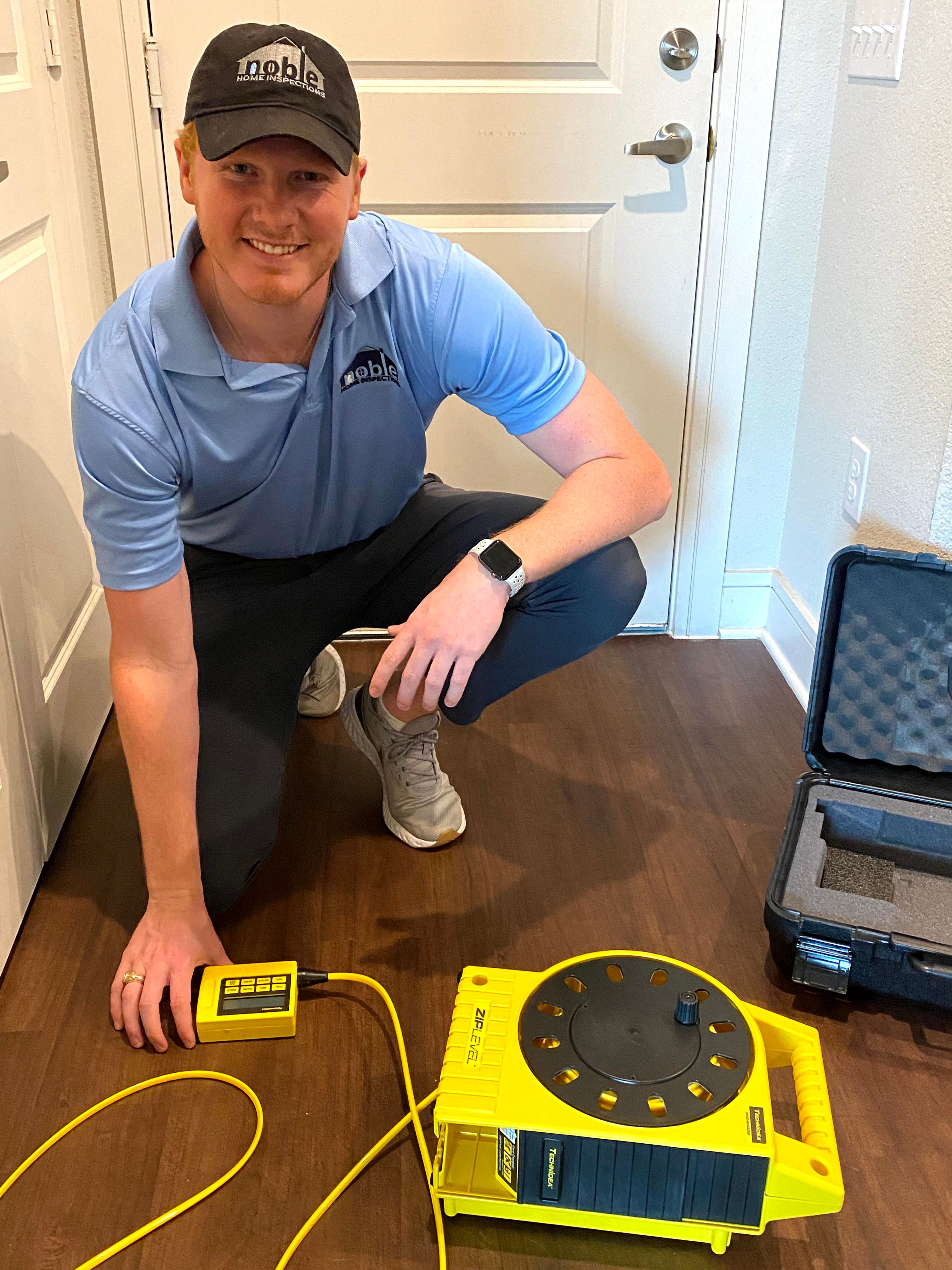 Inspector evaluating a new construction home for warranty defects