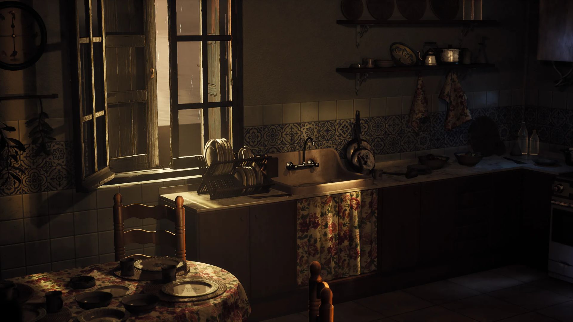 Real-time interior of an old Spanish kitchen at dusk with tiled walls, floral sink curtain and dishes by the window