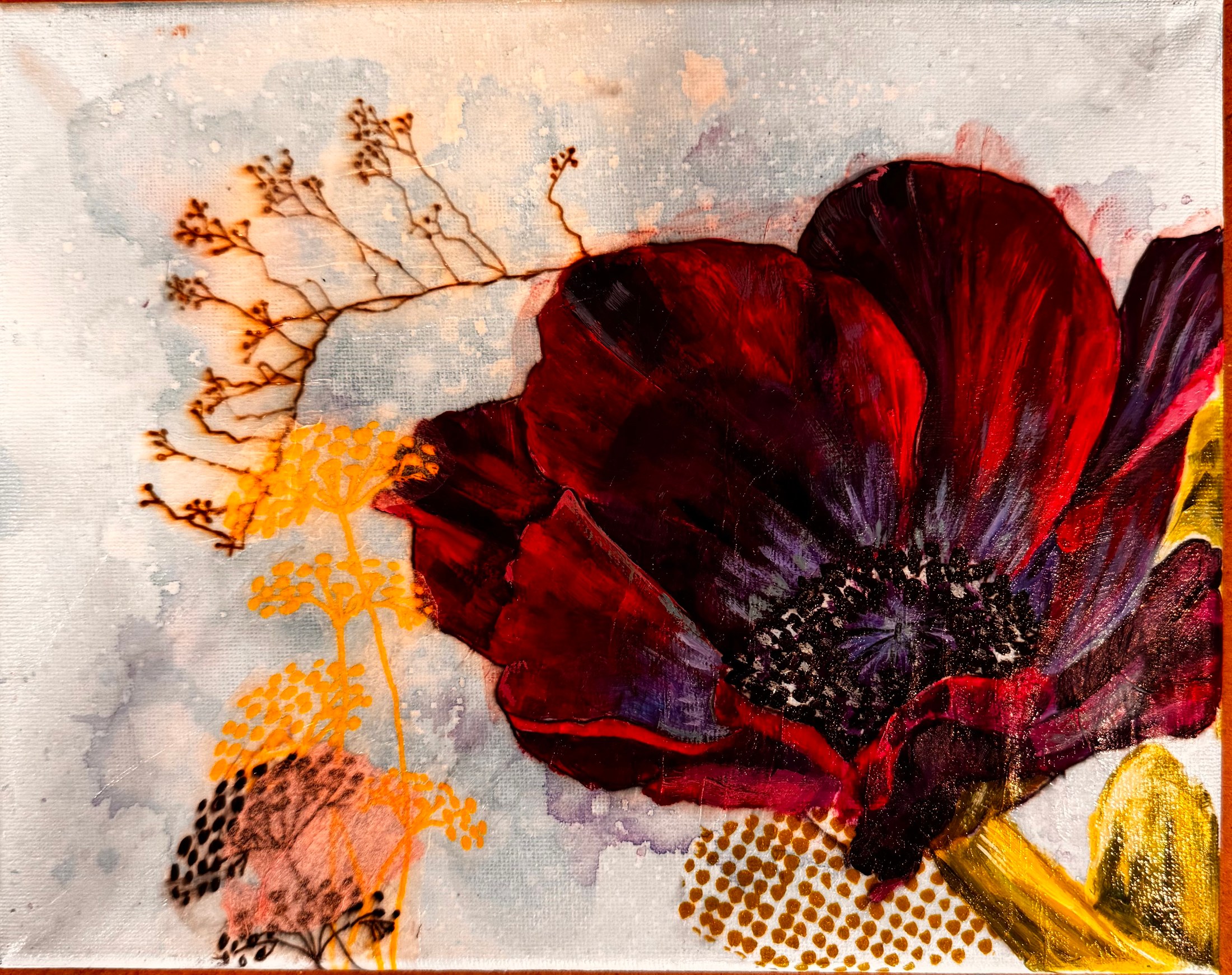 Deep burgundy poppy with a dark center, surrounded by gold, rust, and dotted botanical forms on a pale ground.
