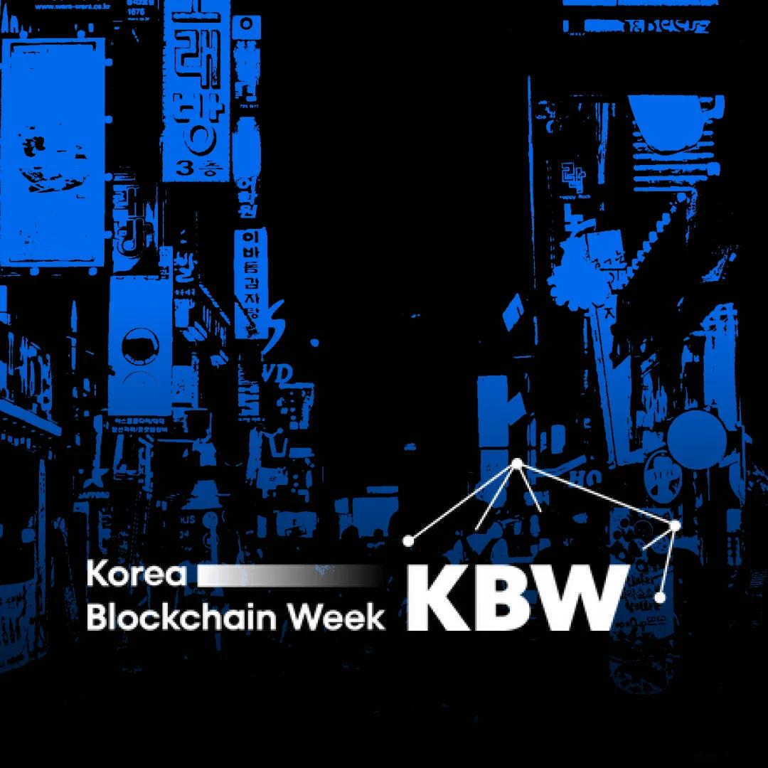 Korea Blockchain Week KBW logo over a blue duotone photograph of a Seoul street at night