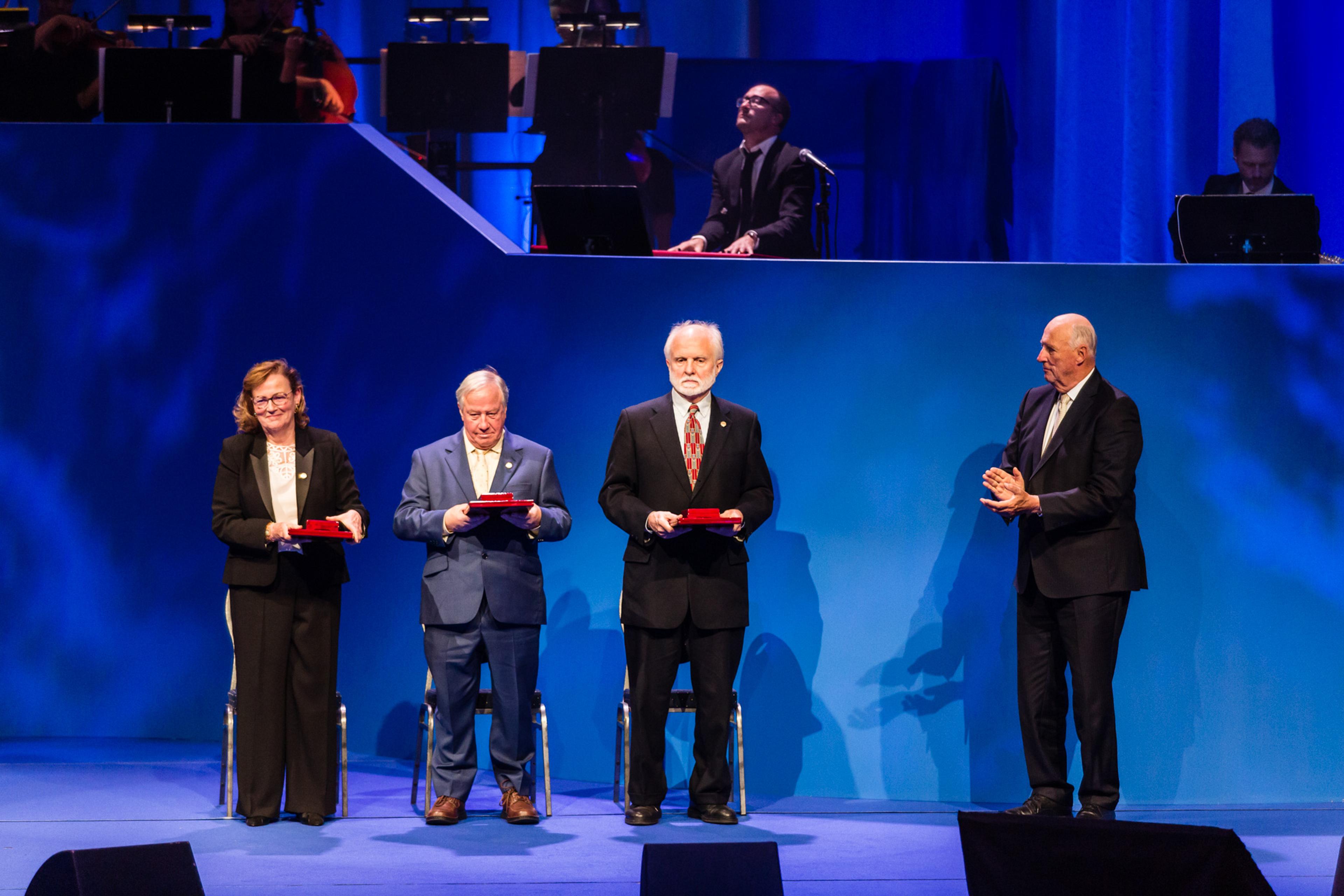 The 2018 Kavli Prize neuroscience laureates on stage in Oslo Concert Hall after having received the awards from His Royal Highness King Harald