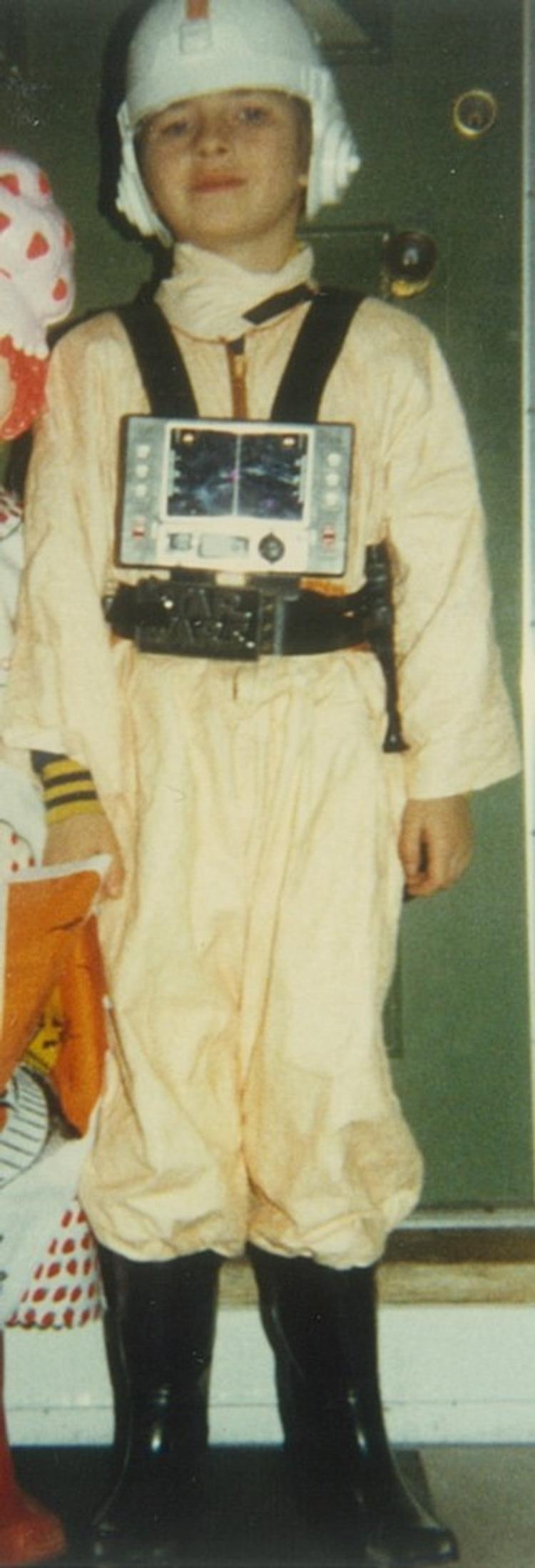 An early interest in space was on display when I chose for Halloween to be a rebel fighter pilot from Star Wars. Importantly my mother fashioned the uniform from a biohazard suit she "borrowed" from her lab and dyed orange.