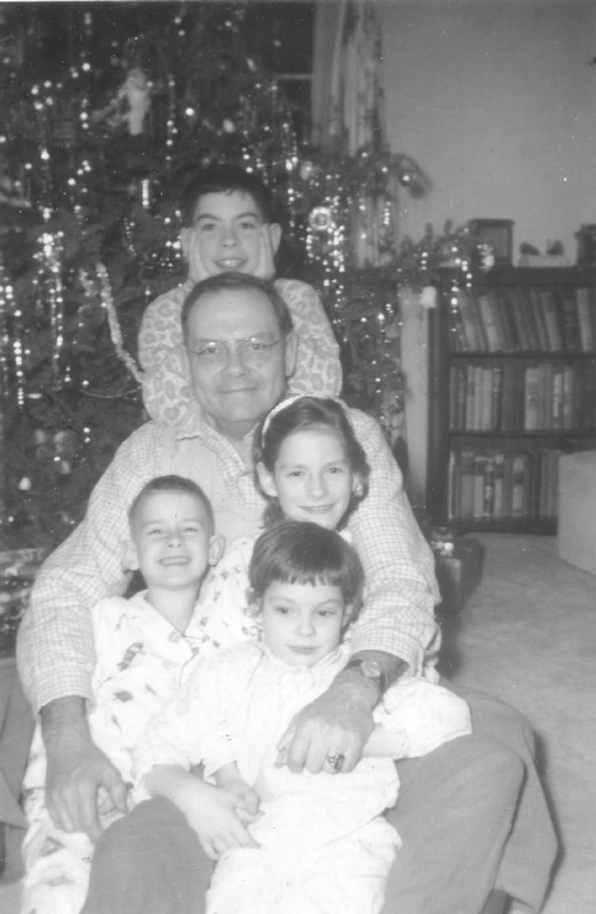 Me (on top), my dad and my three siblings, 1961