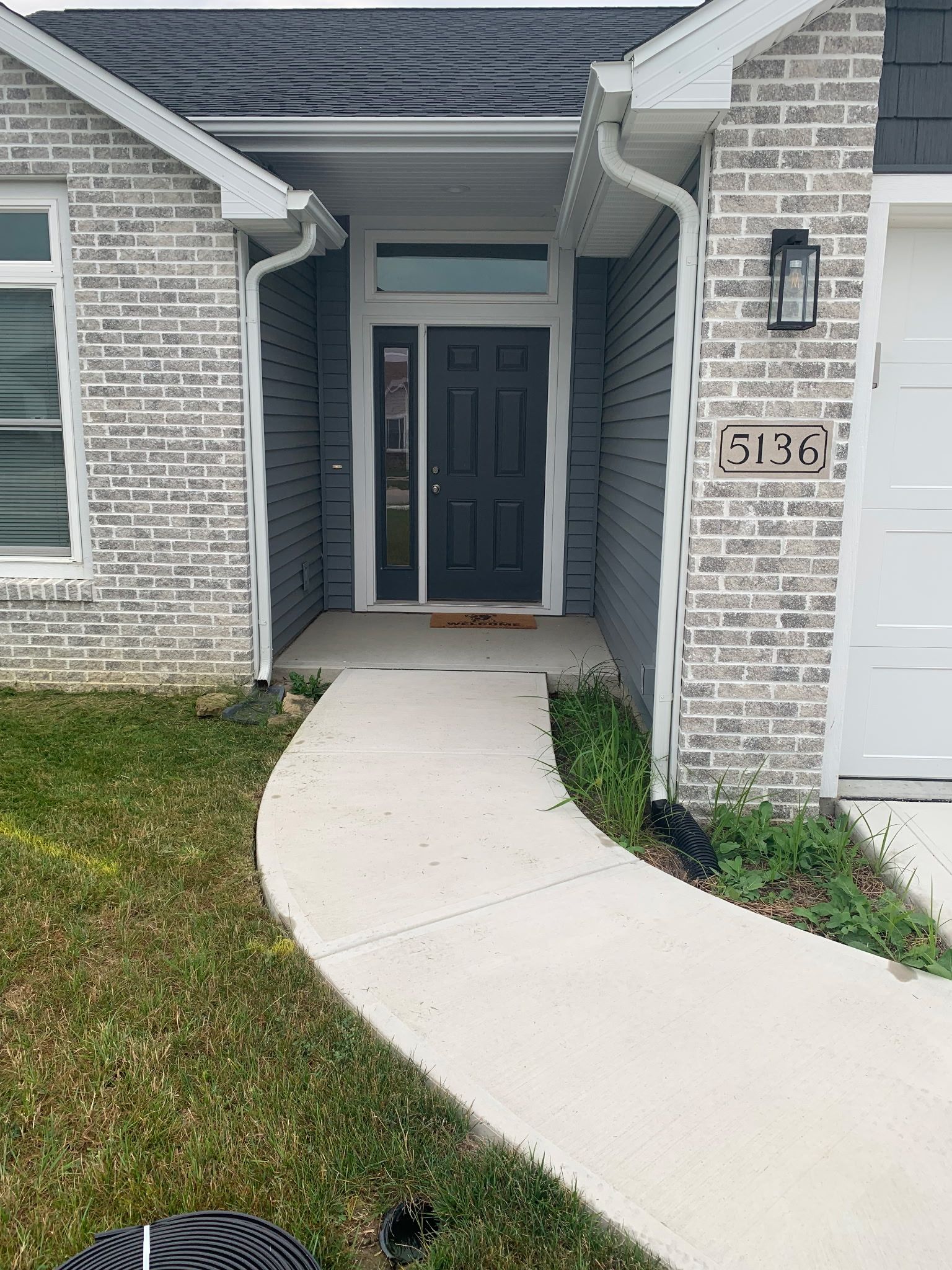 Entrance no landscaping