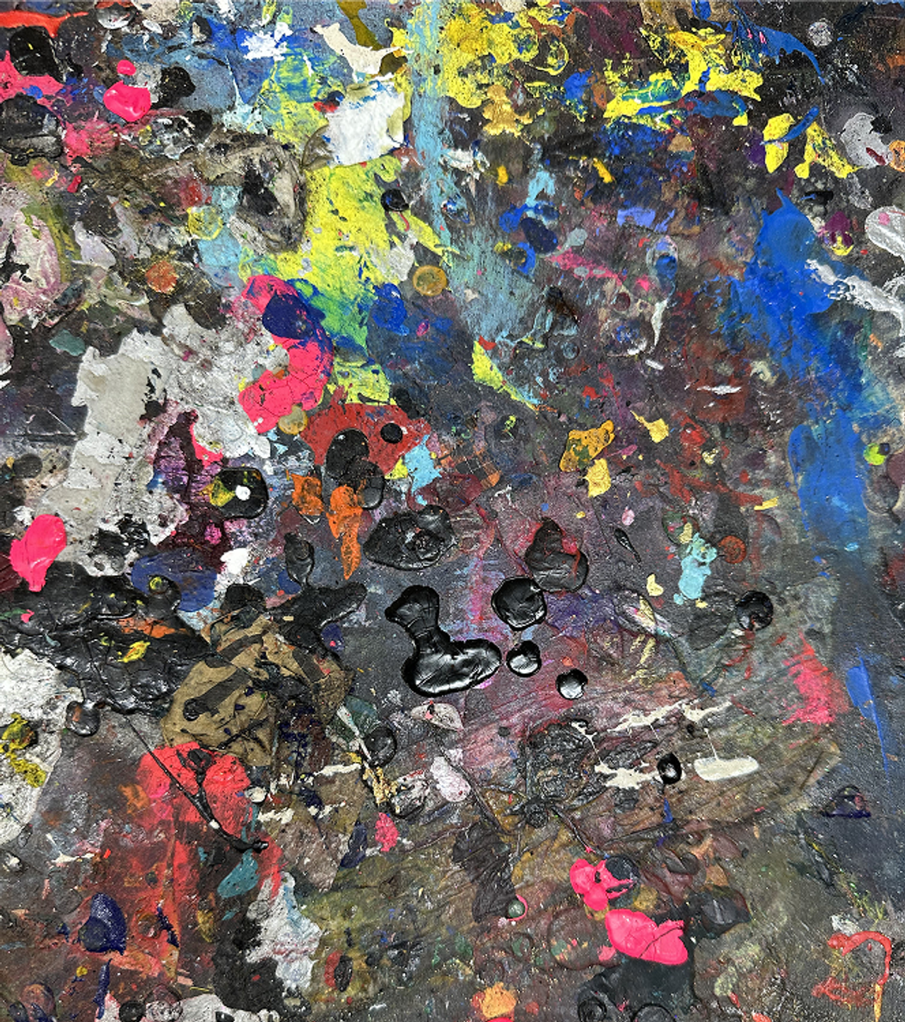 Screen printing paint dots on a sheet of paper