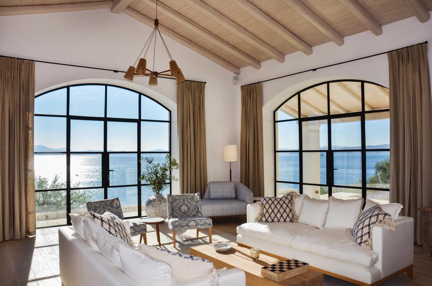 The light-filled living room at Skinos Estate overlooking the Ionian Sea
