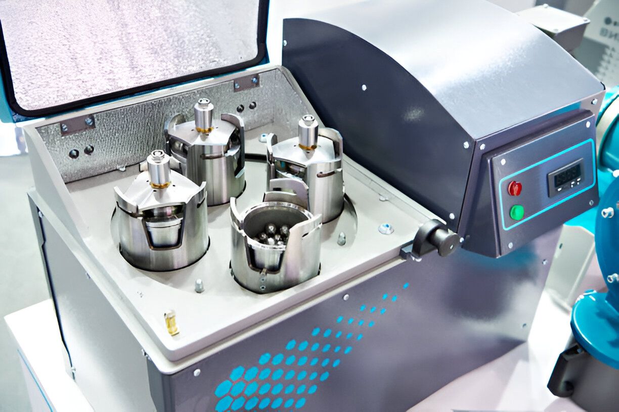 A planetary ball mill shown, designed for efficient particle size reduction and material mixing in laboratory settings