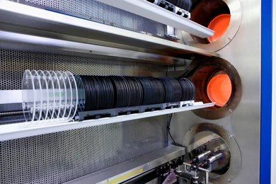  Silicon wafers undergoing processing in a furnace, illustrating a critical phase in the semiconductor fabrication process.