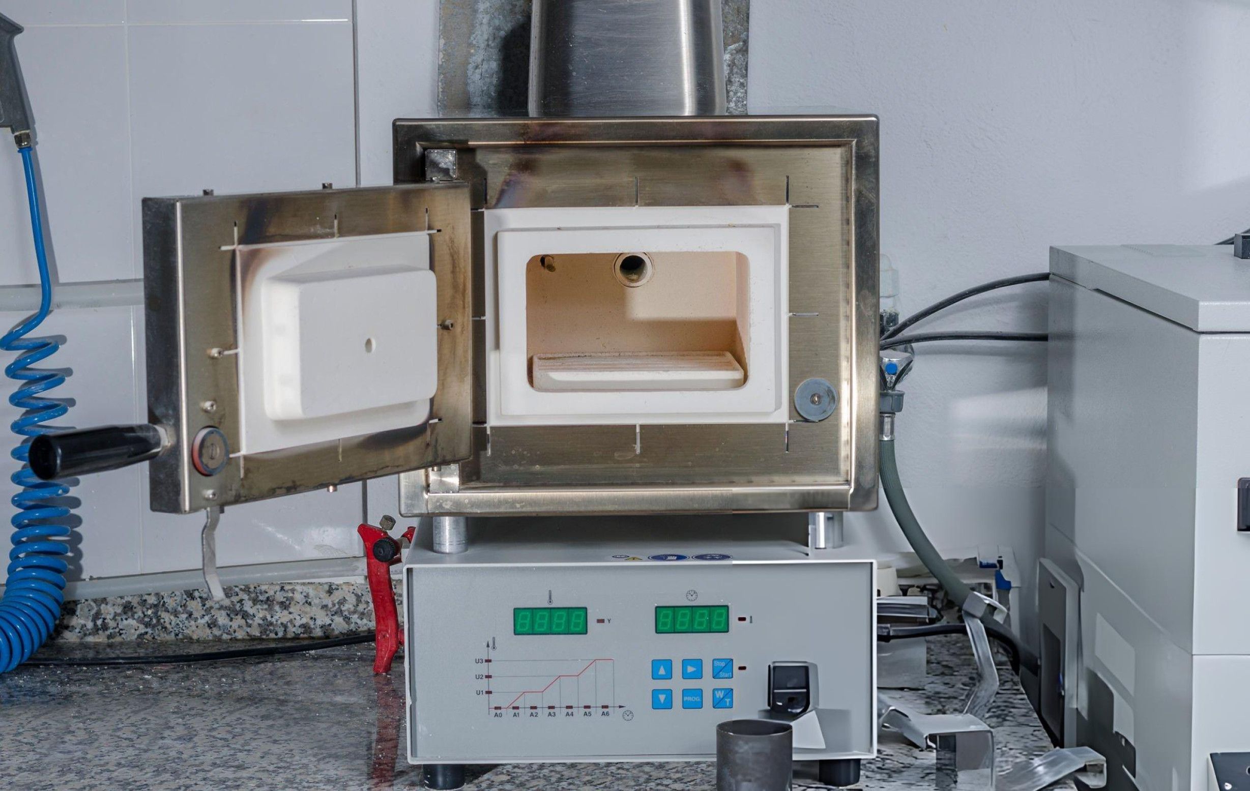 A high-temperature laboratory furnace utilized for conducting experiments and processing materials in a controlled environment.