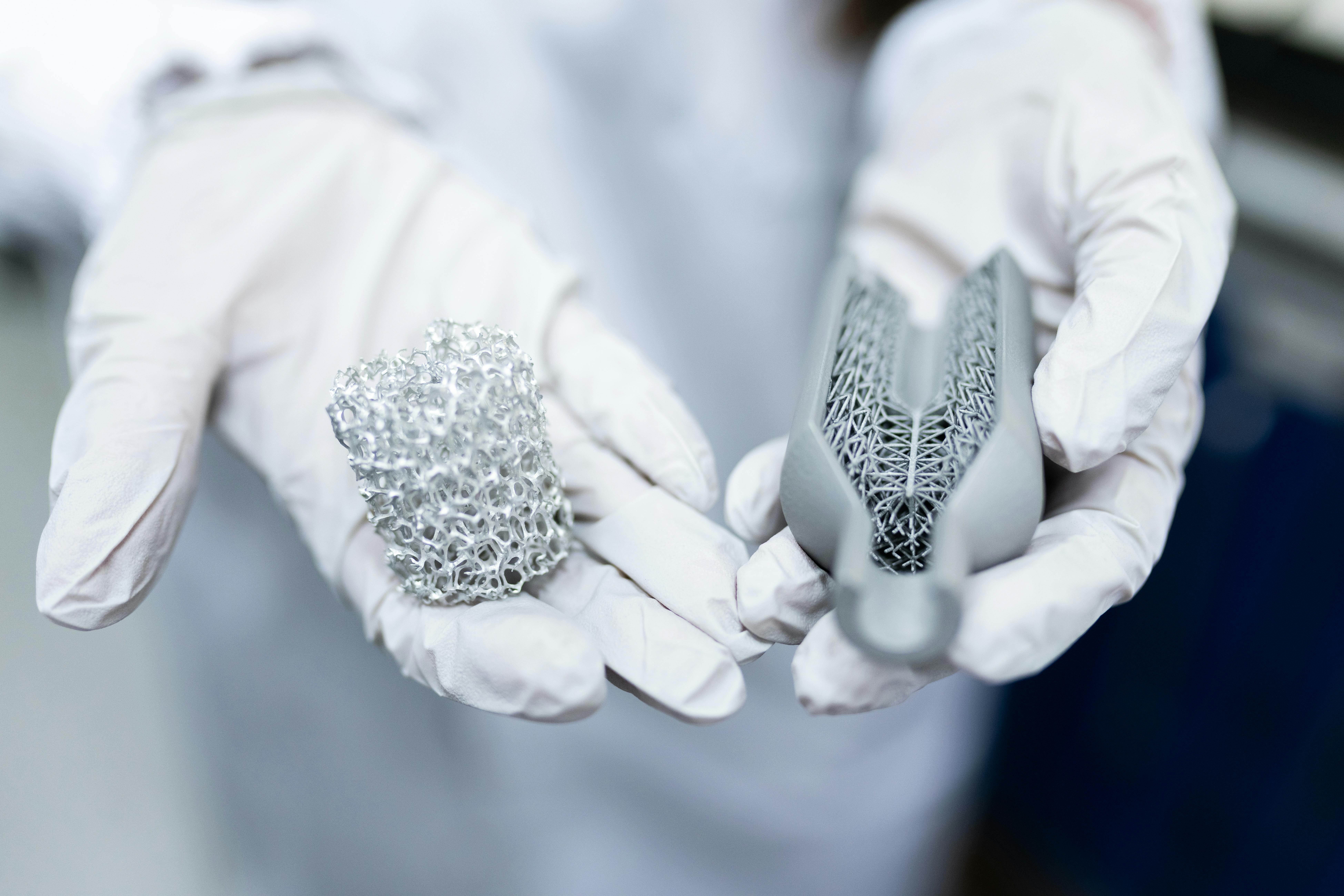 A lab technician holds intricate micro-lattice structures, showcasing advanced material design and research techniques.
A lab technician holds intricate micro-lattice structures, showcasing advanced material design and research techniques.