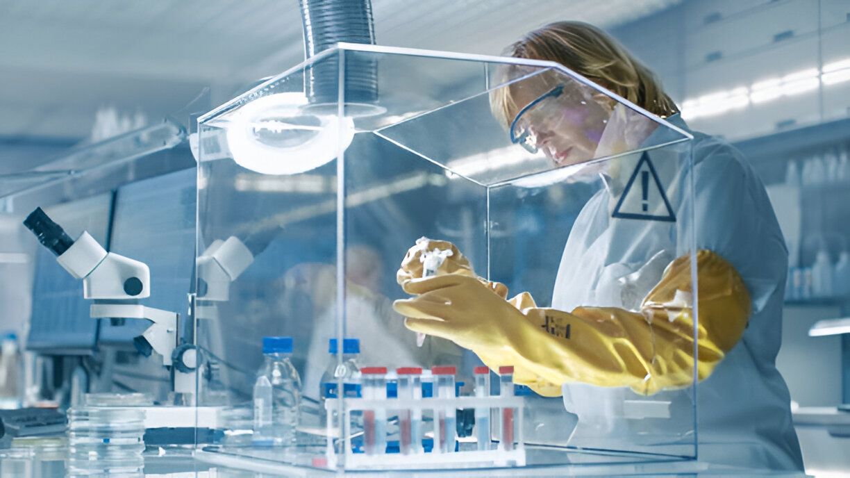  A technician is engaged in tasks inside a tidy Glove Box, maintaining an organized workspace for optimal efficiency.