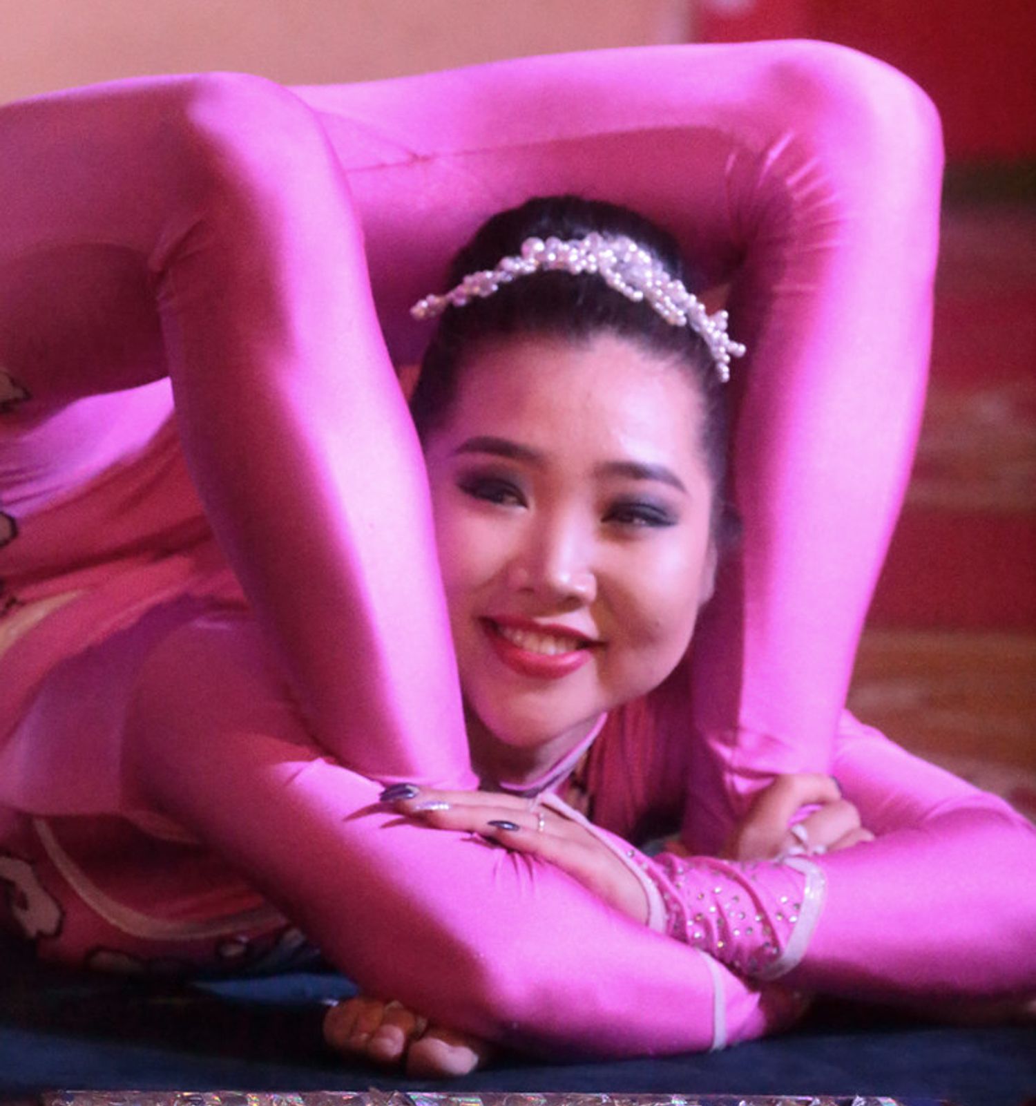 "Why don't you simply stretch and smile?"