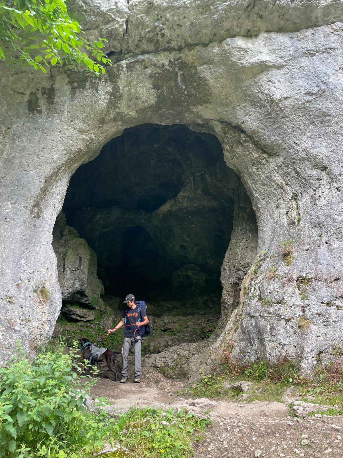 Ronald and Bagheera, his dog in a cave in the peak district