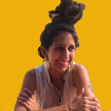 A photo cut out of Maria Fernanda Nuñez and placed on a bright yellow background.