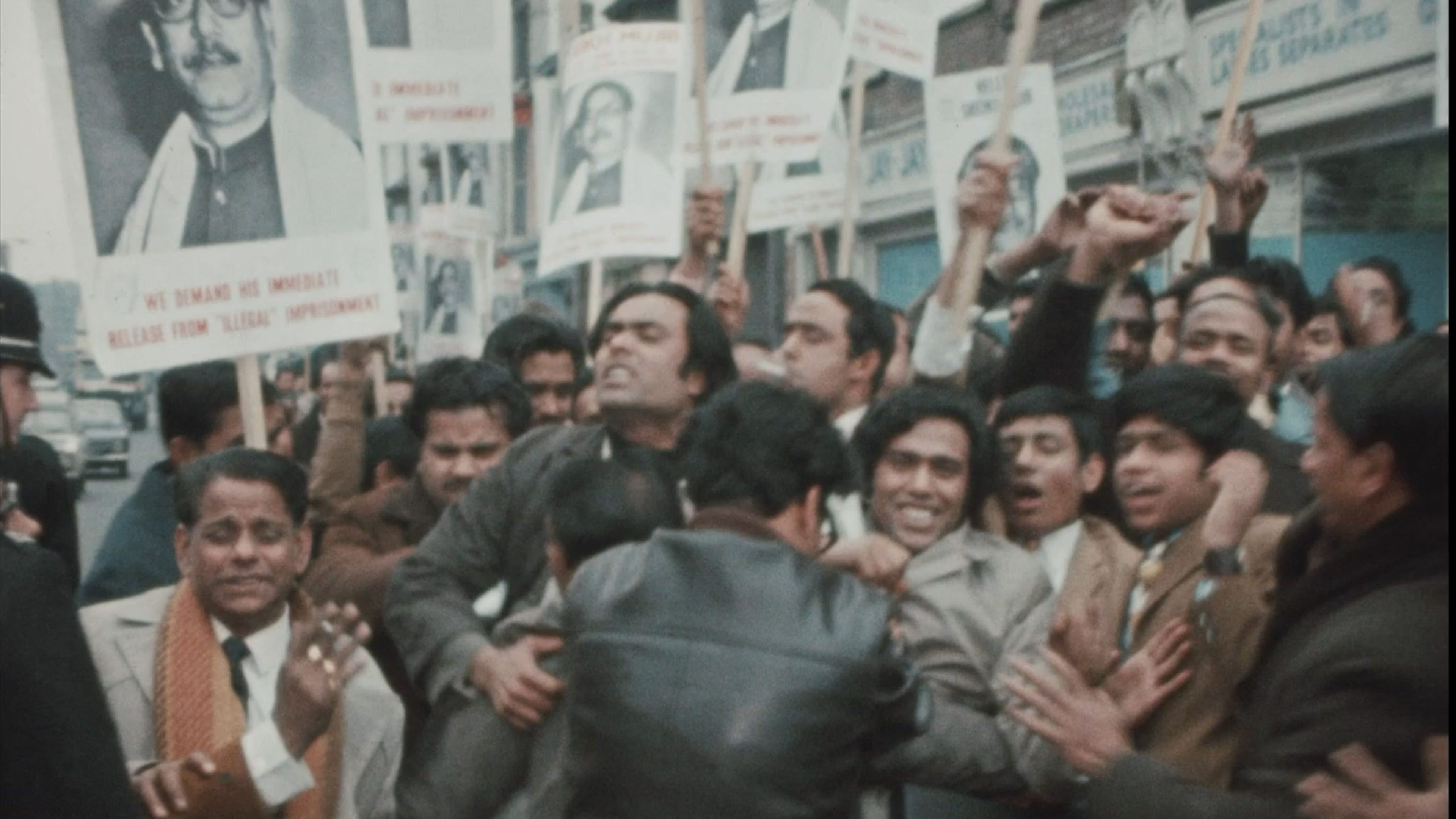 Archival footage from 1971 showing people protesting in the streets of Birmingham.