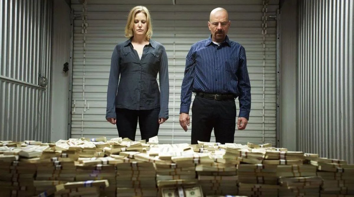 Breaking-bad-scene-where-Walter-White-and-Skylar-stand-in-front-of-a-huge-pile-of-cash copy