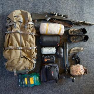 Hunters gear laid out across the floor