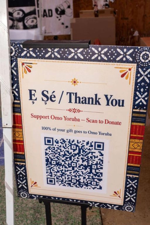 The Ẹ Ṣé thank-you board with the donation QR code