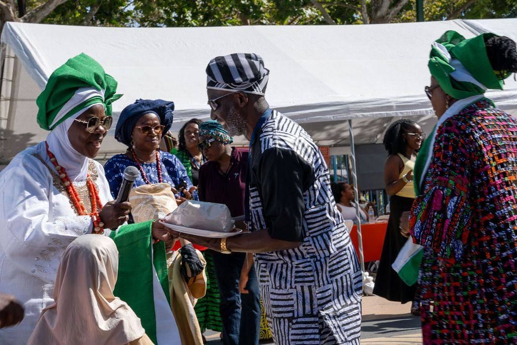 A gift is presented to the association's leaders at the opening