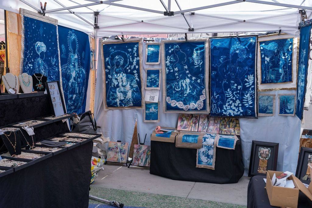 A booth of indigo cyanotype prints and jewelry