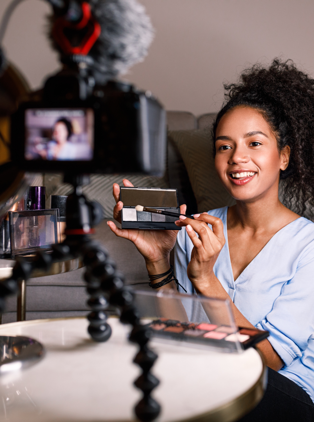 a woman creating user generate content marketing ad showing makeup