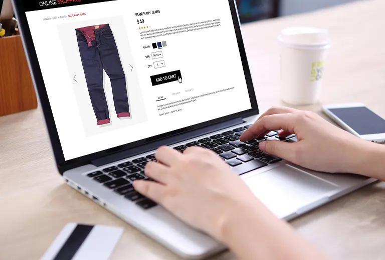 Person shopping on their laptop.