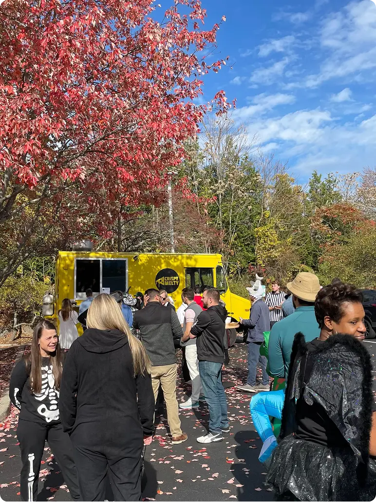Group of people outside a food truck