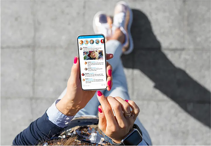 Person looking at an app on their phone.