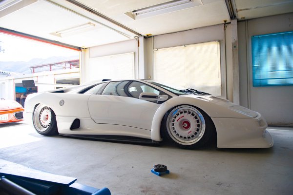 White Lamborghini Diablo lowered on BBS wheels in the Madlane garage
