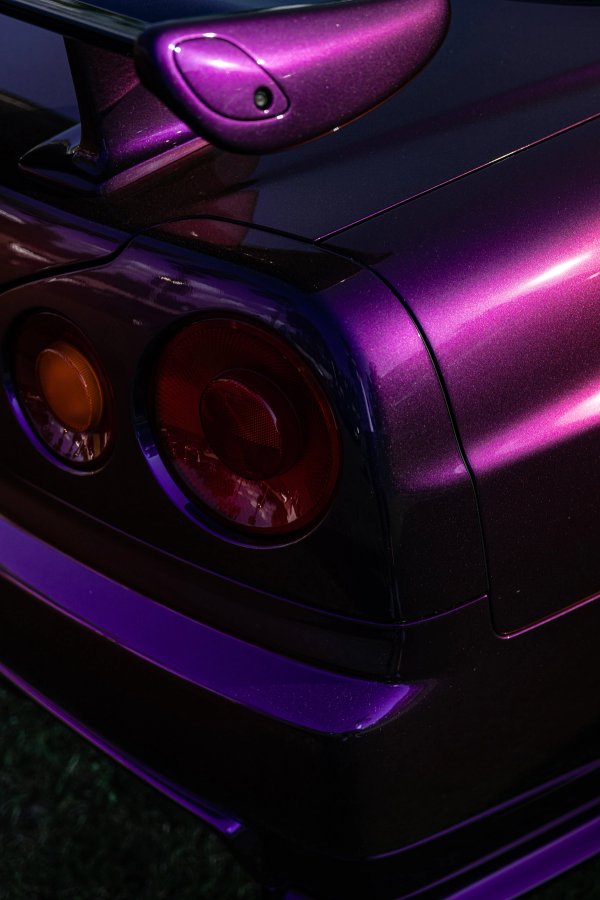 Purple Nissan Skyline R34 tail light detail in midnight purple