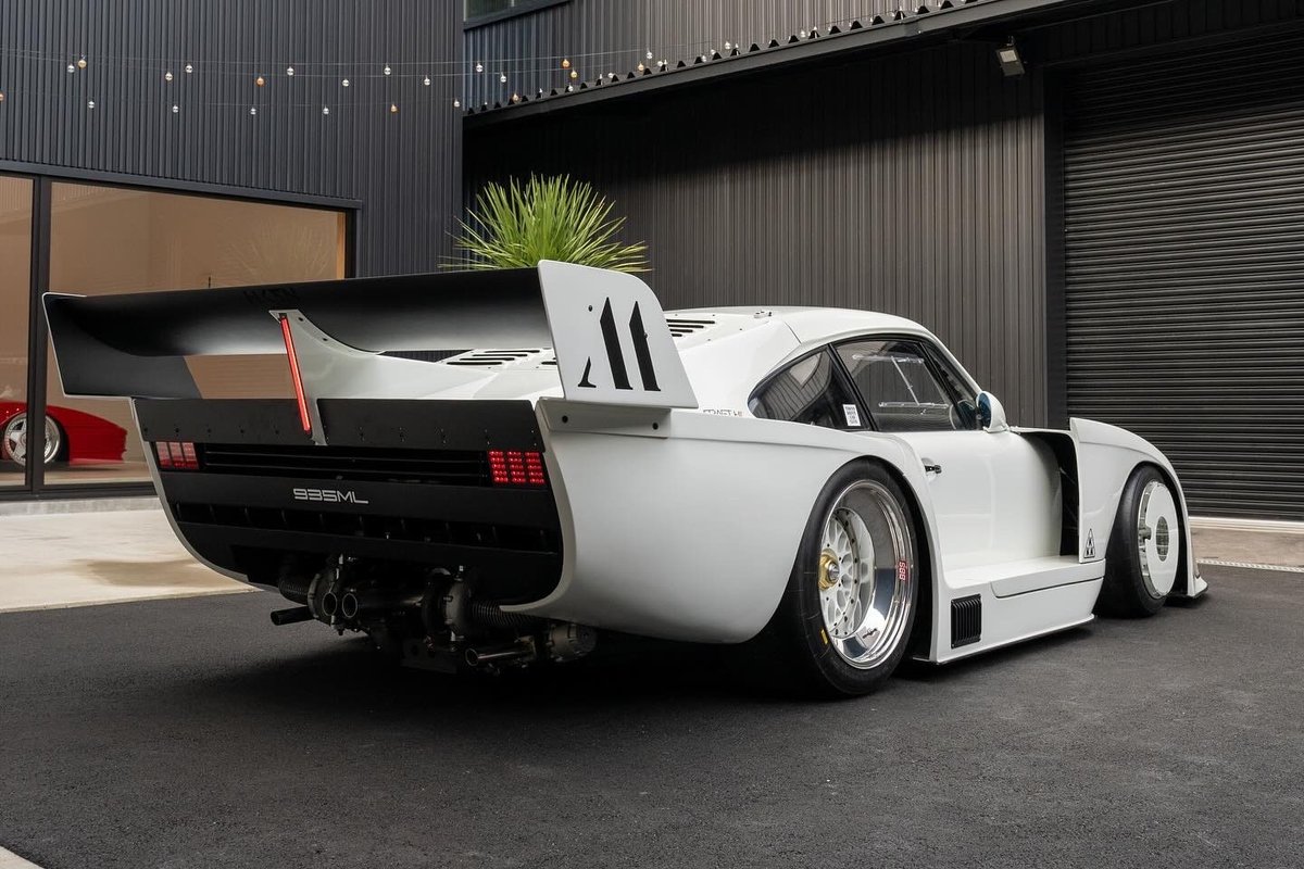 Rear three-quarter of the 935ML showing badge and massive rear wing