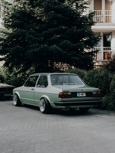Pastel green Jetta Mk1 coupé on gold BBS wheels, a Das Original 1980 sticker in the rear window
