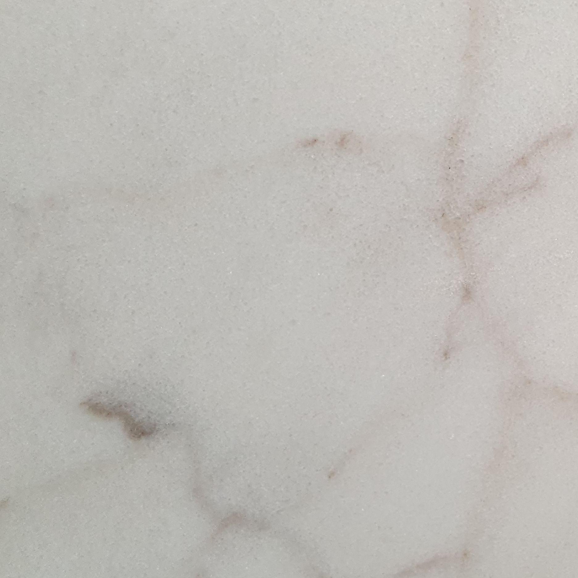 Polished Calacatta Sugar white marble tile, cool white with taupe and gold veining