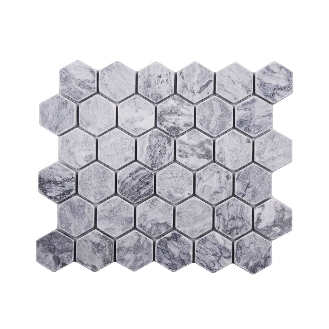 Tumbled Platinum Grey marble two-inch hexagon mosaic tile in silver-grey with charcoal veining