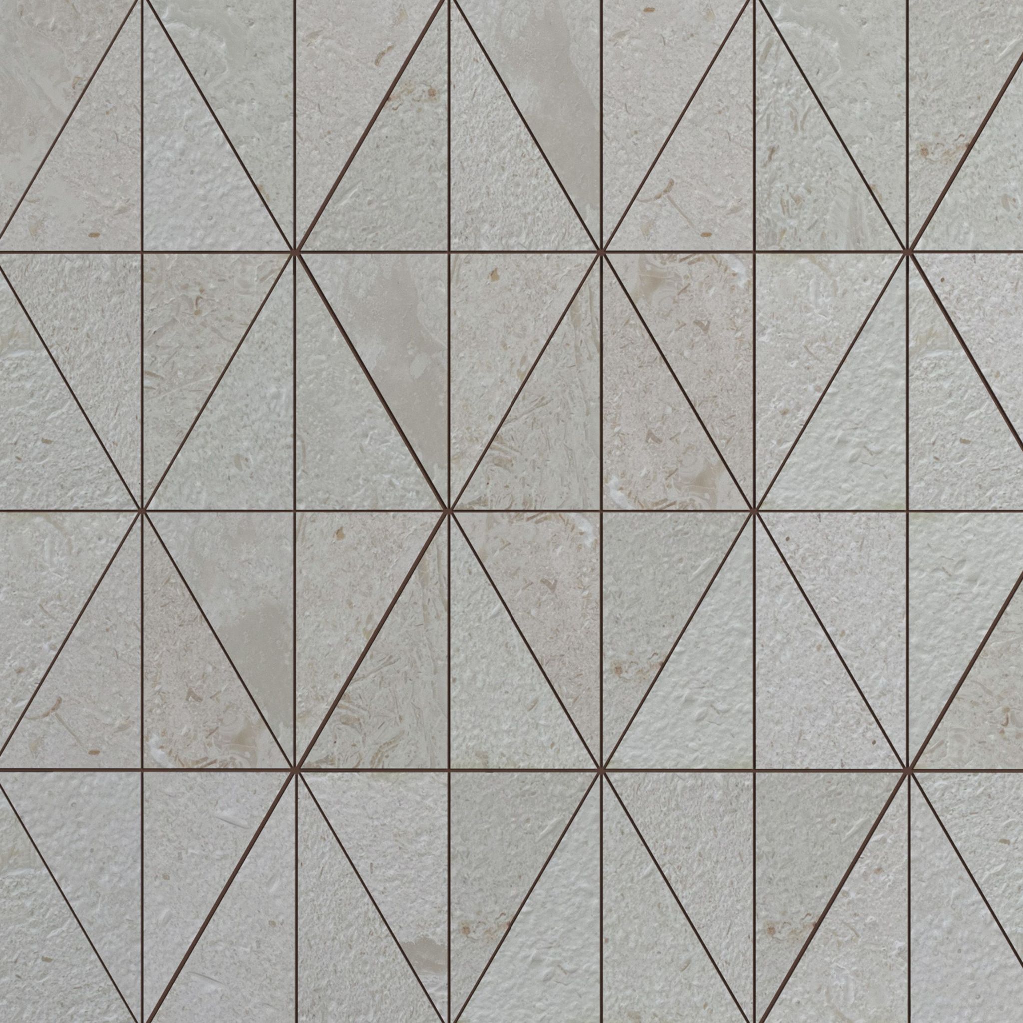 Brushed Shellstone limestone triangle mosaic tile in chalk, ecru and ash-blonde with fossils