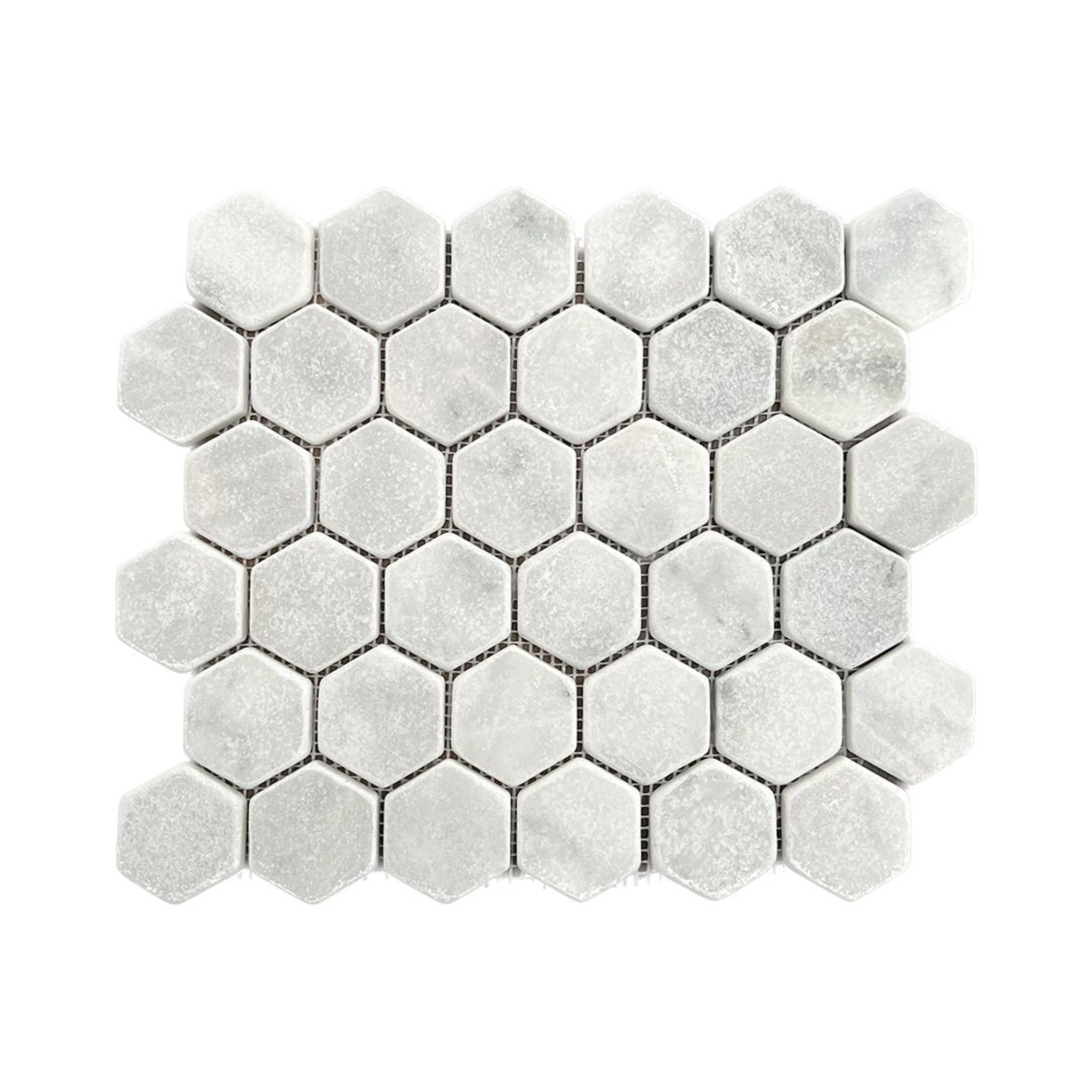 Tumbled Carrara White marble two-inch hexagon mosaic tile with cloudy grey veining