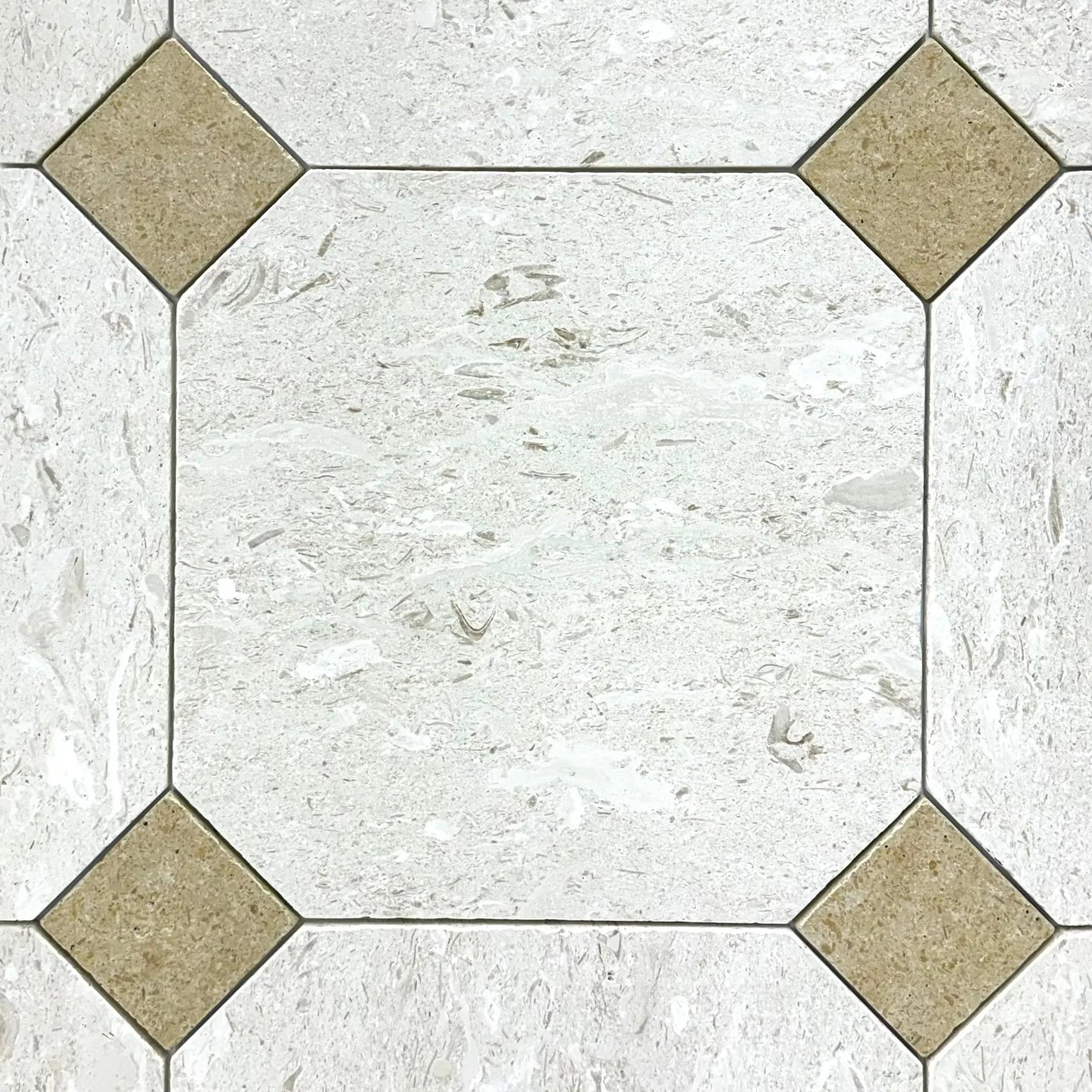 Tumbled Shellstone limestone and Classic travertine octagon tile, pale with tan cabochons