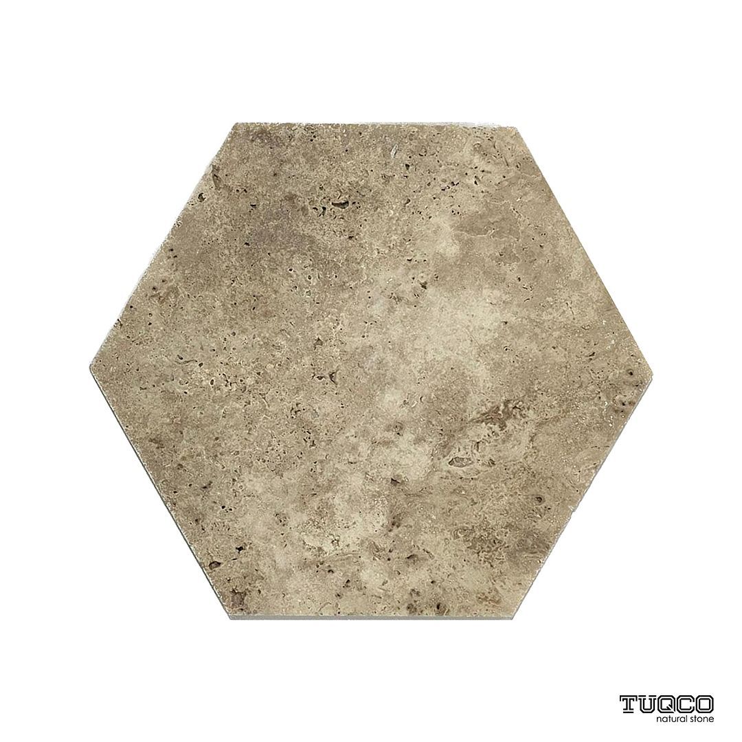 Honed Valencia travertine hexagon tile in soft taupe, sandy beige and biscuit