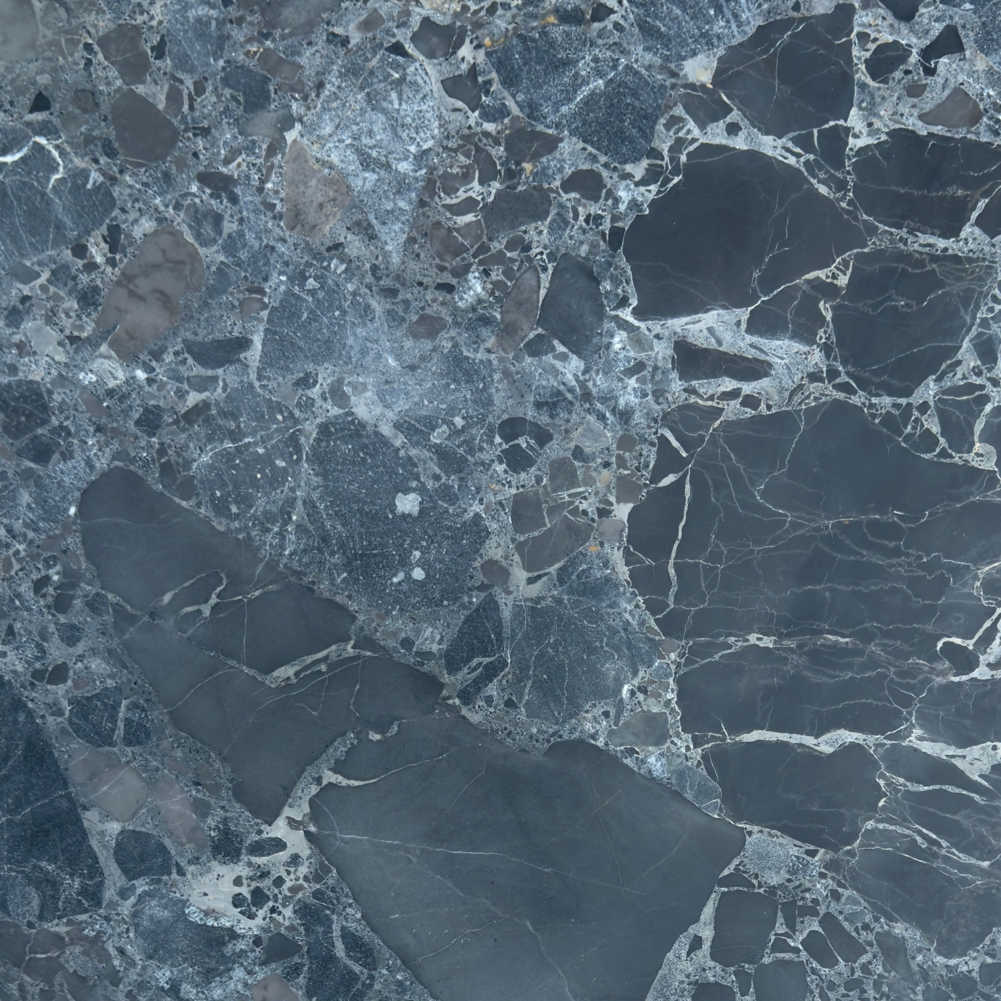 Honed Selene marble tile, charcoal and slate with icy white brecciated veining