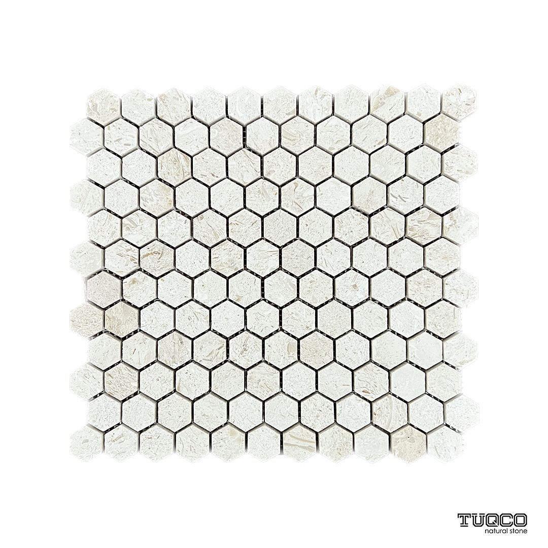 Brushed Shellstone limestone eight-inch hexagon mosaic tile, creamy with fossil inclusions