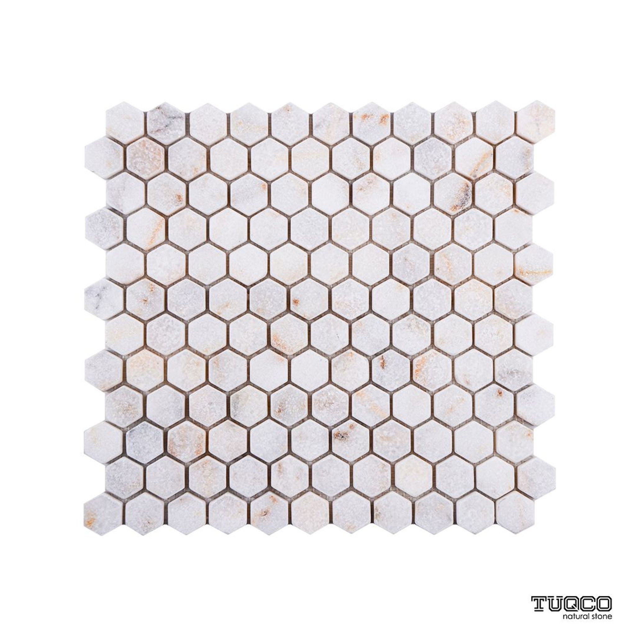 Tumbled Calacatta Sugar marble hexagon mosaic tile in gold, amber and ochre