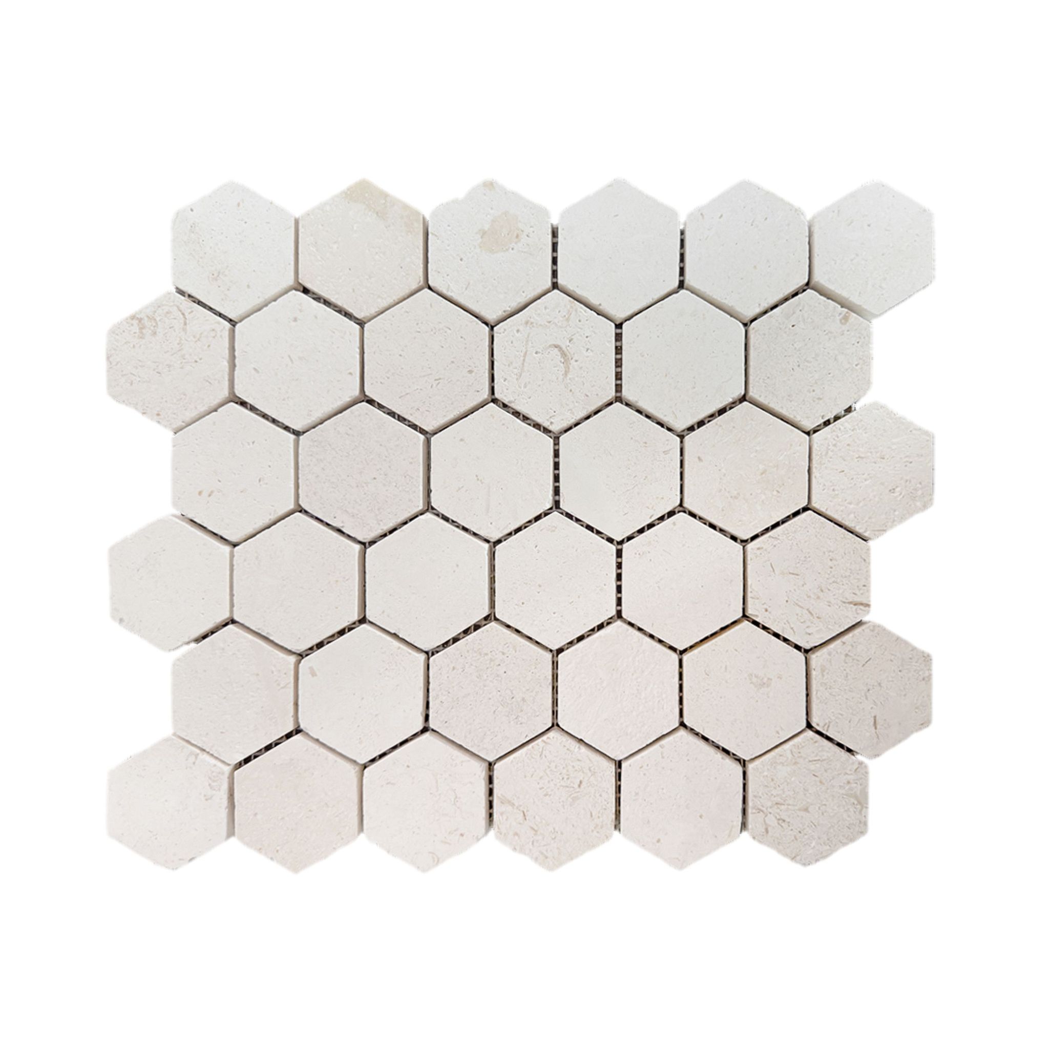Honed Shellstone limestone two-inch hexagon mosaic tile, creamy ivory with fossils
