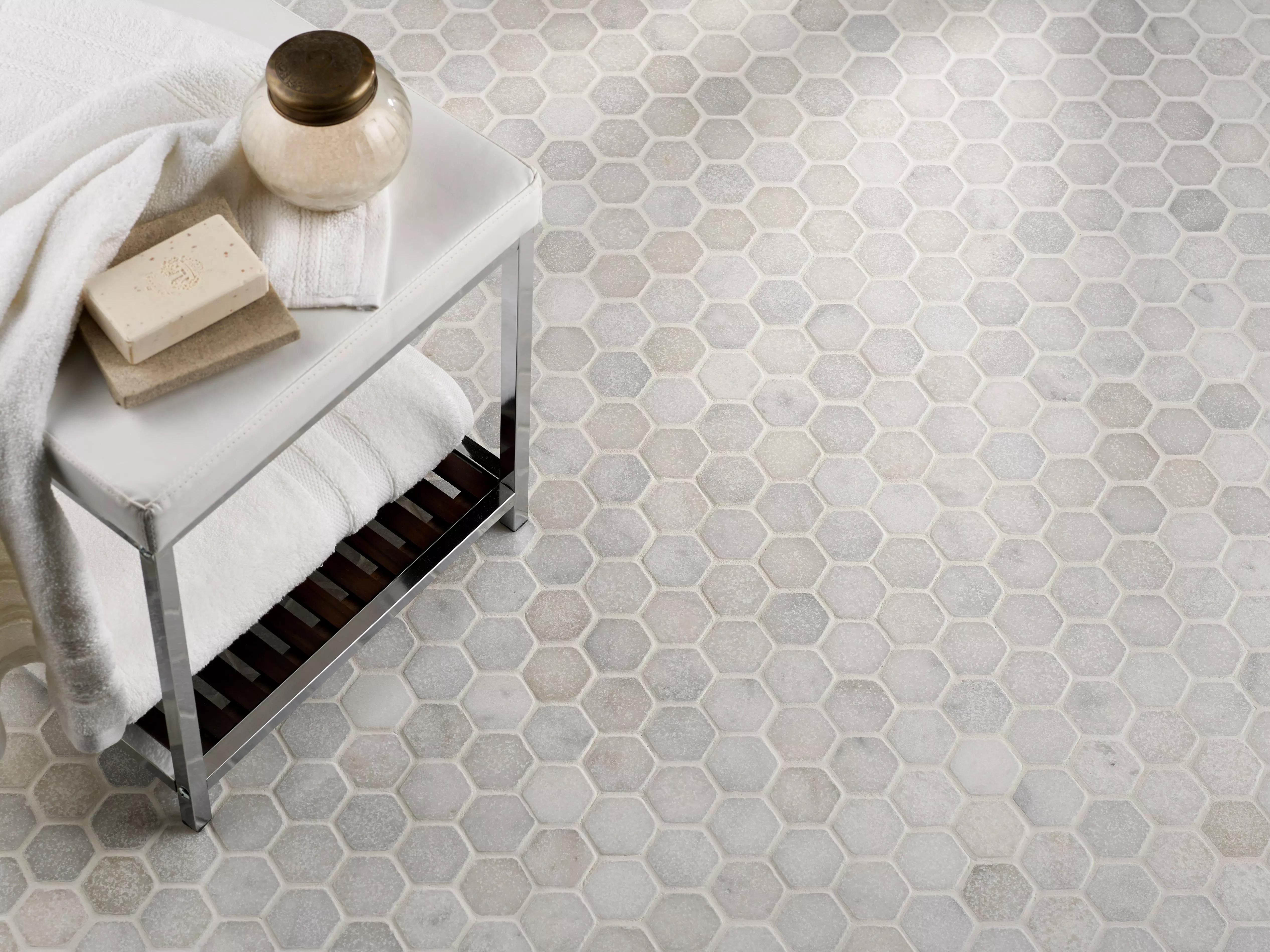 Tumbled Carrara White marble two-inch hexagon mosaic tile with cloudy grey veining thumbnail 3