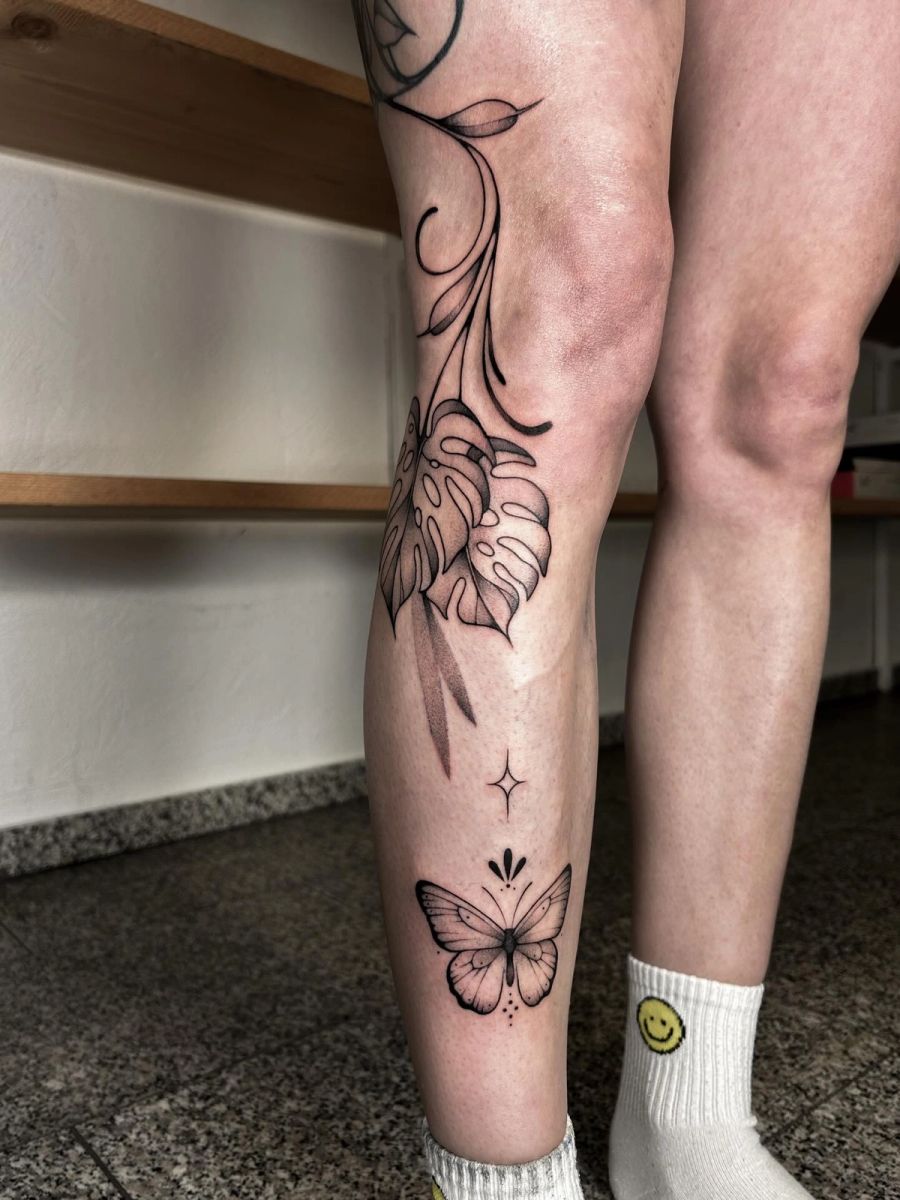 Blume und Schmetterling am Bein, Fineline