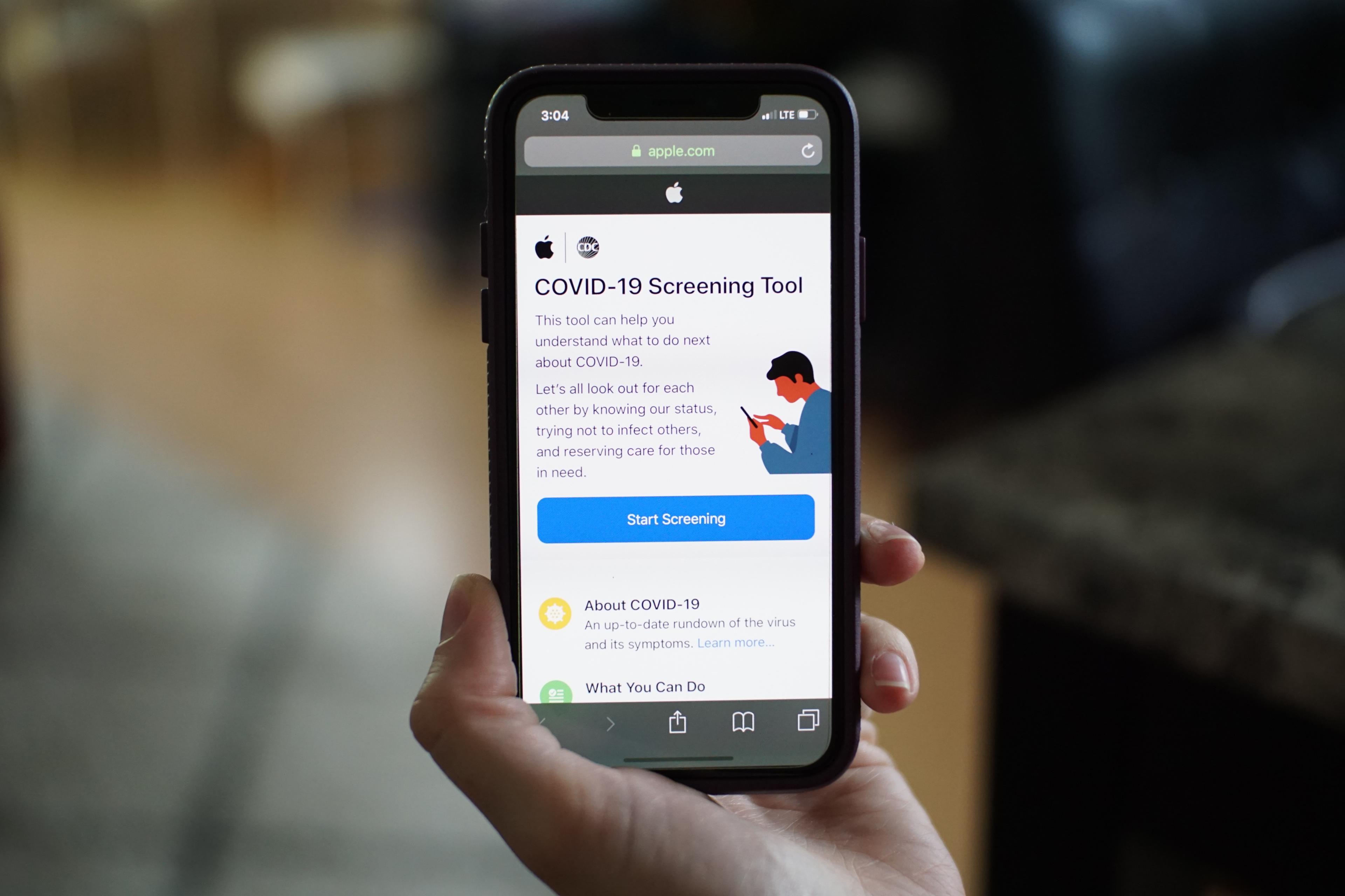 Phone showing COVID-19 screen tool