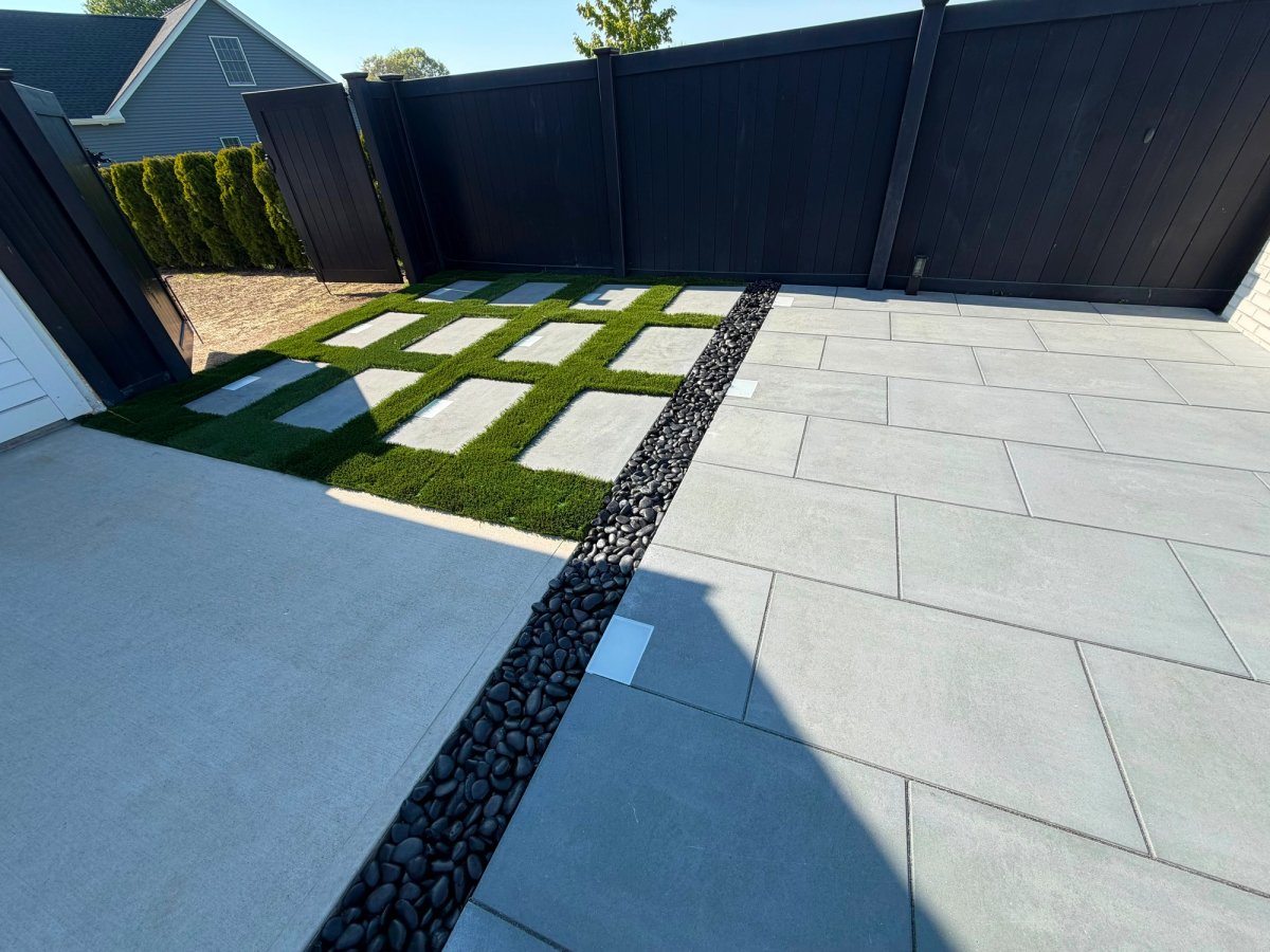 Modern Patio with Turf Grid and Porcelain Tiles