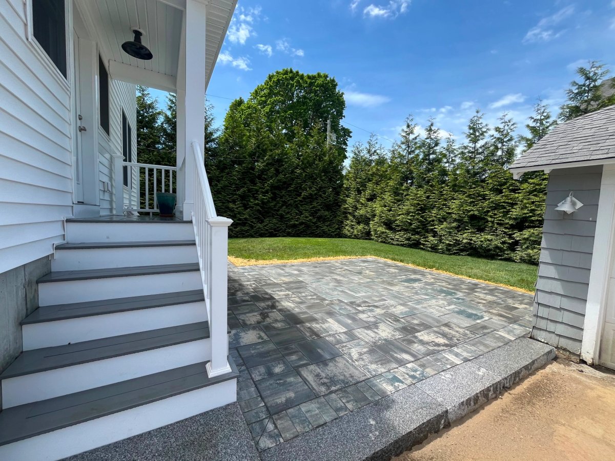 Paver Patio Edge Detail with Evergreen Privacy Hedge