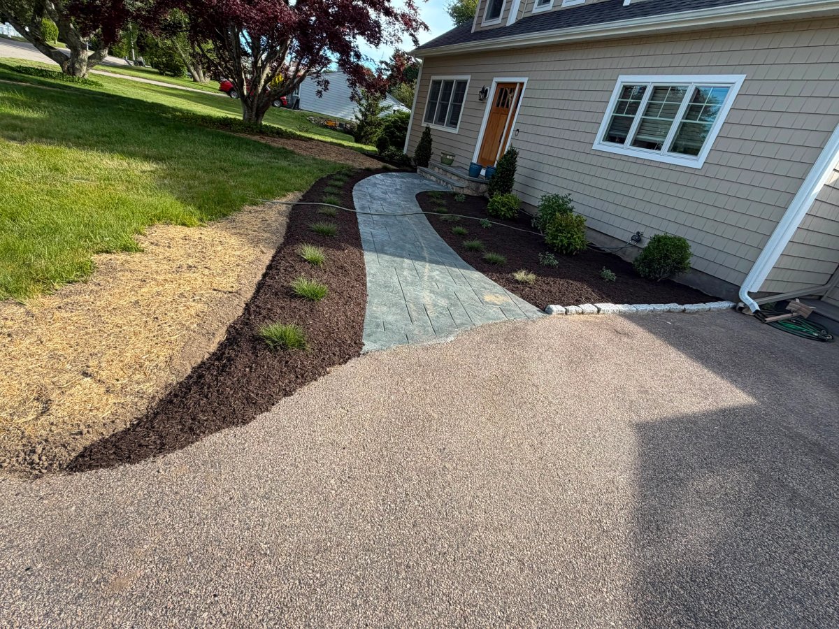 Stamped Concrete Walkway with Front Garden Beds